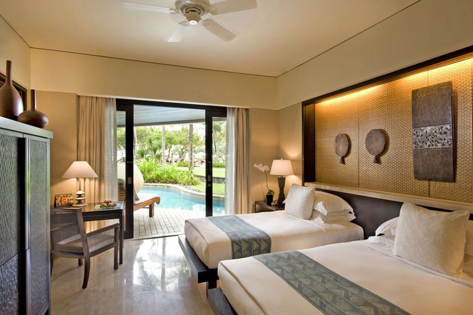 Imagen de la habitación del Hotel Conrad Bali. Foto 14