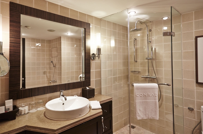 Imagen de la habitación del Hotel Conrad Bangkok Residences. Foto 11