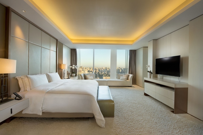 Imagen de la habitación del Hotel Conrad Beijing. Foto 14