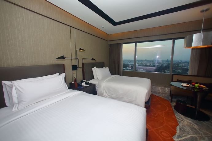 Imagen de la habitación del Hotel Conrad Bengaluru. Foto 14