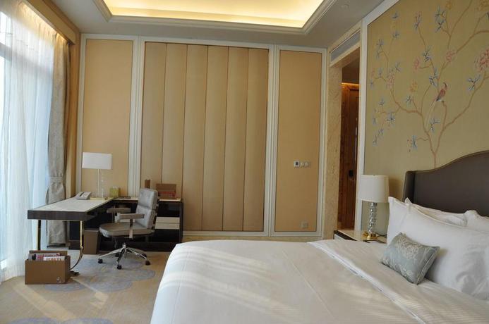 Imagen de la habitación del Hotel Conrad Dalian. Foto 7
