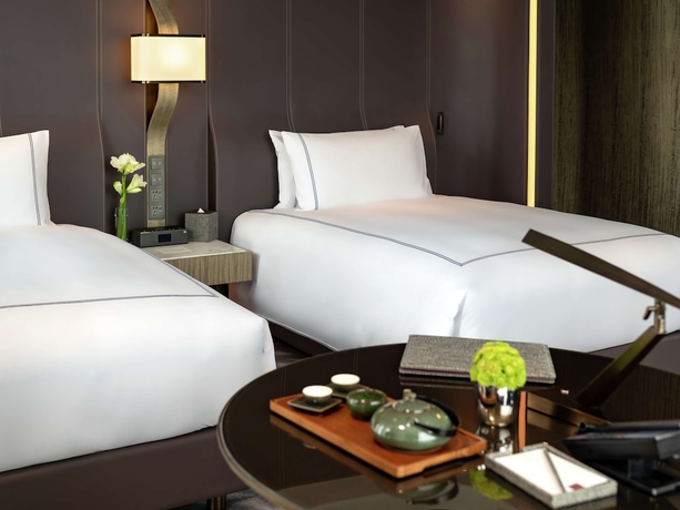 Imagen de la habitación del Hotel Conrad Hangzhou. Foto 17