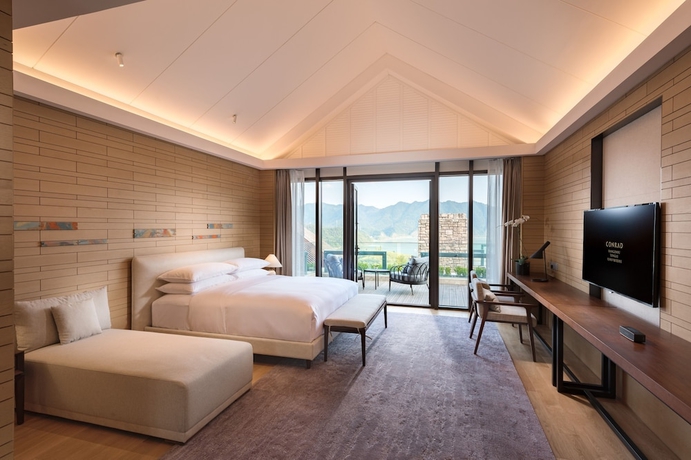 Imagen de la habitación del Hotel Conrad Hangzhou Tonglu. Foto 6