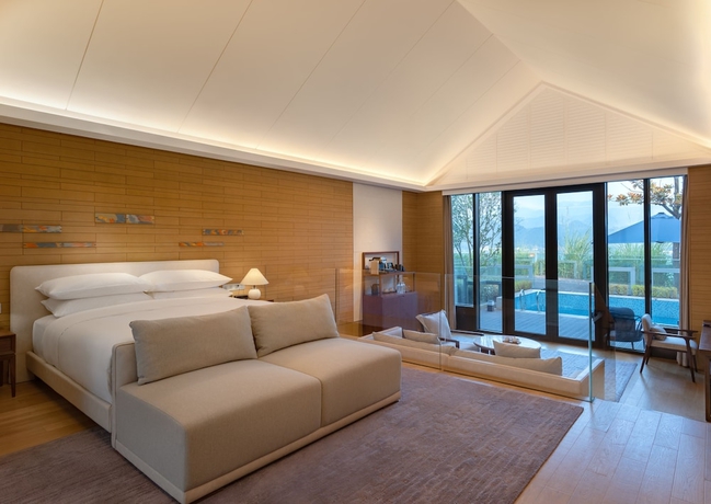 Imagen de la habitación del Hotel Conrad Hangzhou Tonglu. Foto 8