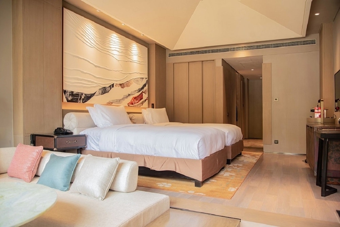 Imagen de la habitación del Hotel Conrad Jiuzhaigou. Foto 3