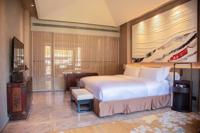 Imagen de la habitación del Hotel Conrad Jiuzhaigou. Foto 4