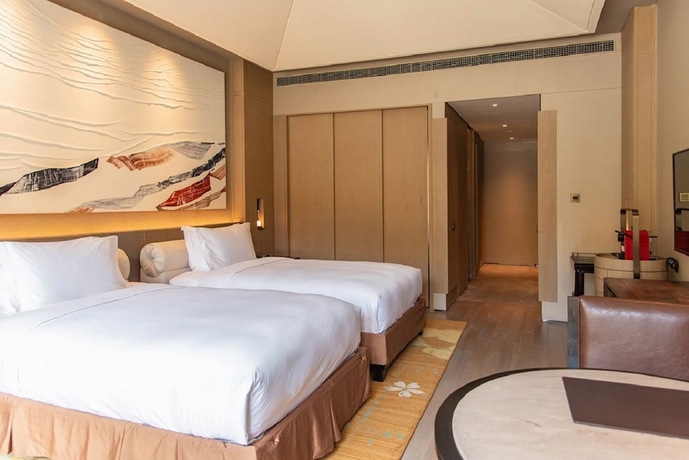 Imagen de la habitación del Hotel Conrad Jiuzhaigou. Foto 9