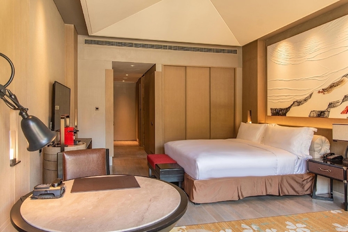 Imagen de la habitación del Hotel Conrad Jiuzhaigou. Foto 13