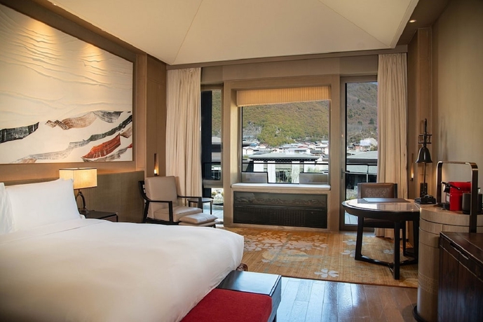Imagen de la habitación del Hotel Conrad Jiuzhaigou. Foto 14