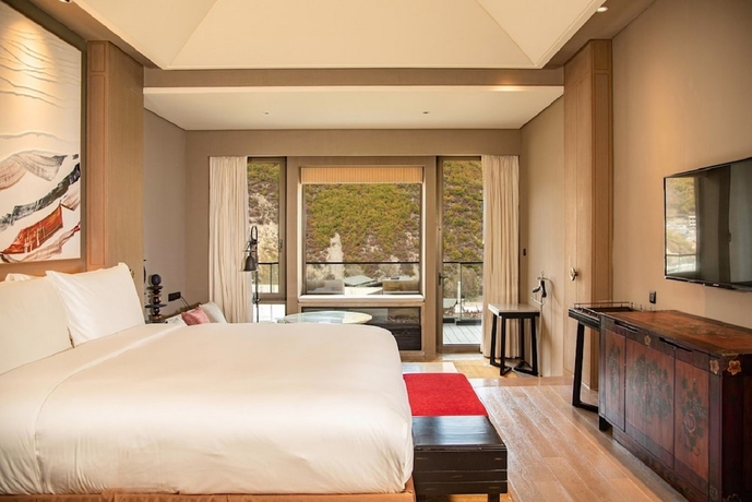 Imagen de la habitación del Hotel Conrad Jiuzhaigou. Foto 16