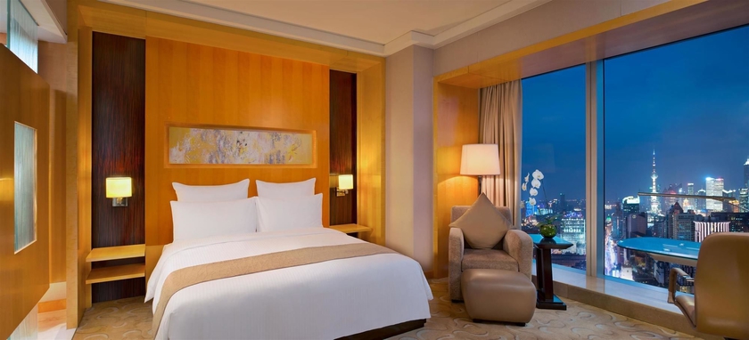 Imagen de la habitación del Hotel Conrad Shanghai. Foto 8