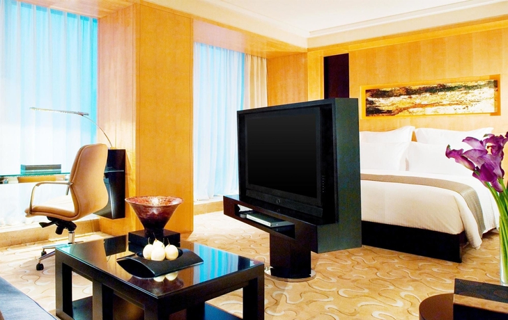 Imagen de la habitación del Hotel Conrad Shanghai. Foto 9
