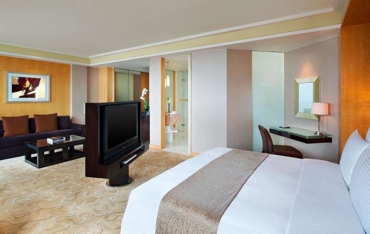 Imagen de la habitación del Hotel Conrad Shanghai. Foto 10