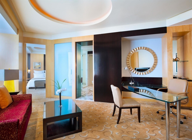 Imagen de la habitación del Hotel Conrad Shanghai. Foto 13