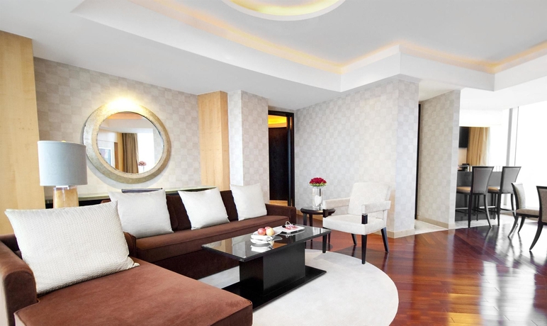 Imagen de la habitación del Hotel Conrad Shanghai. Foto 15