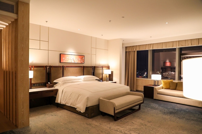 Imagen de la habitación del Hotel Conrad Shenyang. Foto 9