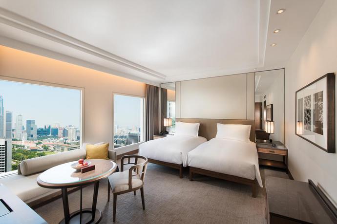 Imagen de la habitación del Hotel Conrad Singapore Marina Bay. Foto 5