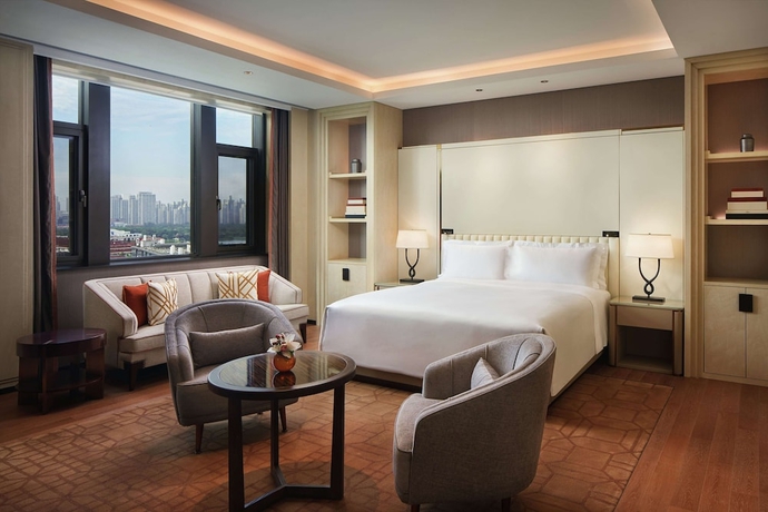 Imagen de la habitación del Hotel Conrad Tianjin. Foto 5