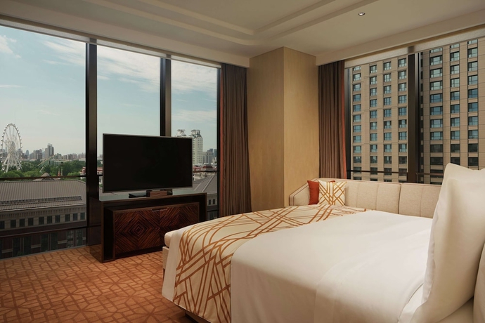 Imagen de la habitación del Hotel Conrad Tianjin. Foto 12