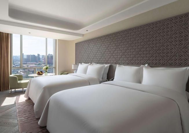 Imagen de la habitación del Hotel Conrad Urumqi. Foto 7