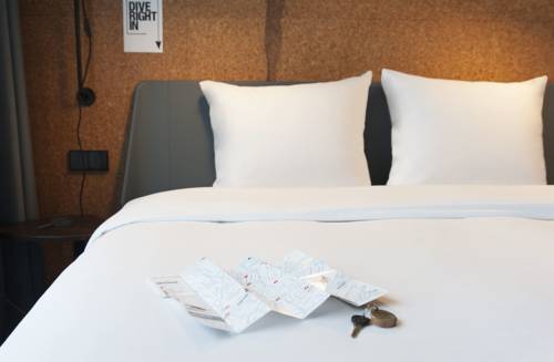 Imagen de la habitación del Hotel Conscious The Tire Station. Foto 7