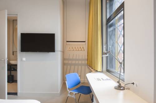 Imagen de la habitación del Hotel Conscious Westerpark. Foto 7