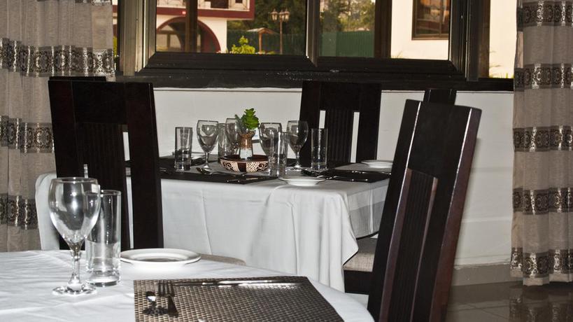 Imagen del bar/restaurante del Hotel Consir Executive Lodge, North Ridge. Foto 2