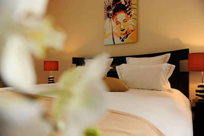 Imagen de la habitación del Hotel Constance Sakoa Boutik. Foto 10