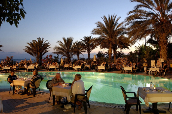 Imagen del bar/restaurante del Hotel Constantinou Bros Athena Beach. Foto 3