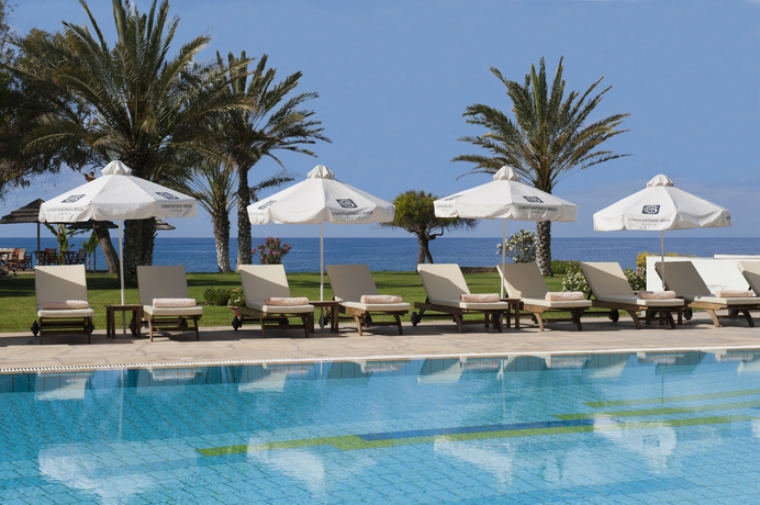 Imagen de la piscina del Hotel Constantinou Bros Athena Royal Beach. Foto 15