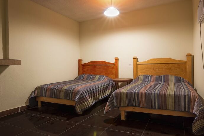 Imagen de la habitación del Hotel Consul Suites. Foto 11