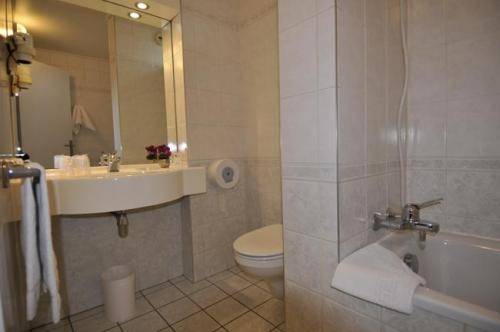 Imagen de la habitación del Hotel Contact Hôtel Foch. Foto 4