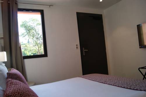 Imagen de la habitación del Hotel Contact Restaurant Le Minervois. Foto 3