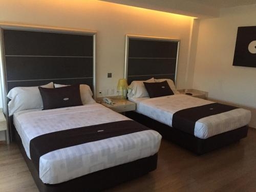 Imagen de la habitación del Hotel Contadero Suites Y Villas. Foto 7