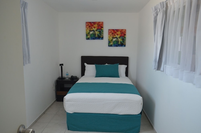 Imagen de la habitación del Hotel Container Inn Aeropuerto. Foto 7