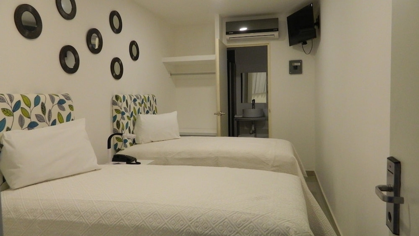 Imagen de la habitación del Hotel Container Inn Aeropuerto. Foto 15