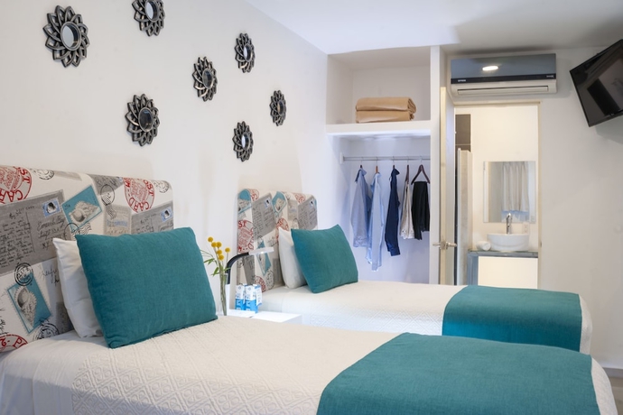 Imagen de la habitación del Hotel Container Inn. Foto 8