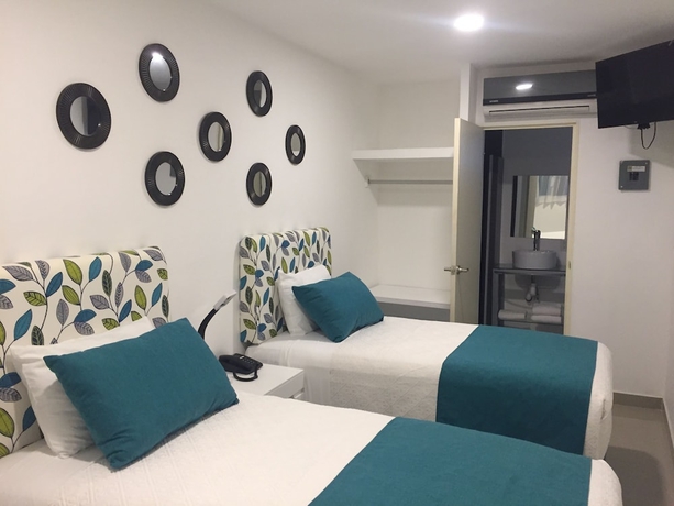 Imagen de la habitación del Hotel Container Inn. Foto 9