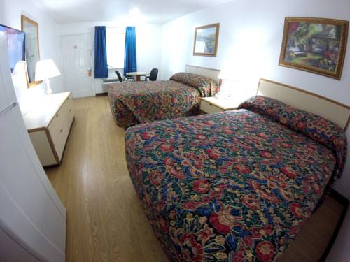 Imagen de la habitación del Hotel Contempra Inn. Foto 3
