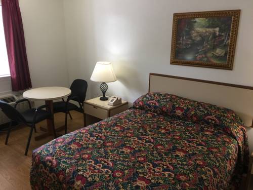 Imagen de la habitación del Hotel Contempra Inn. Foto 6