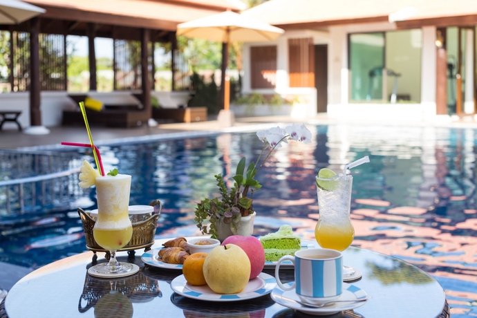 Imagen de la piscina del Hotel Content Villa Chiang Mai. Foto 19