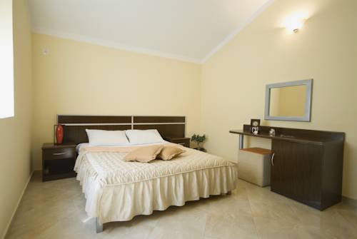 Imagen de la habitación del Hotel Contessa Apartments. Foto 6