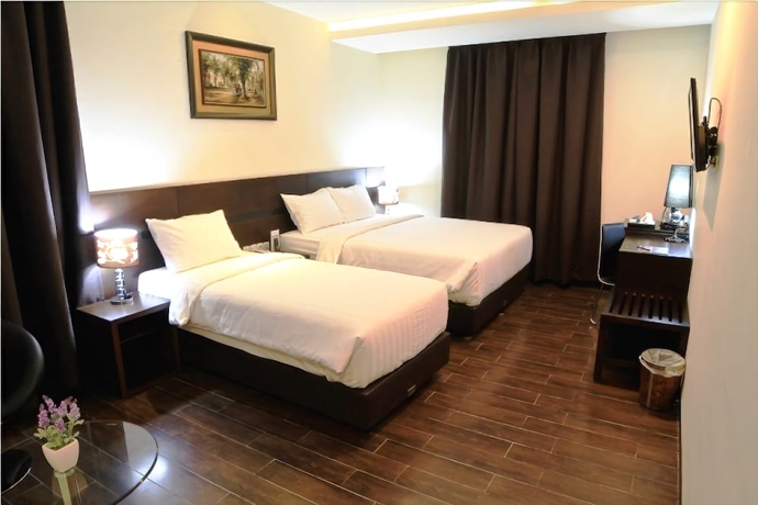 Imagen de la habitación del Hotel Continent Centrepoint Panakkukang. Foto 6