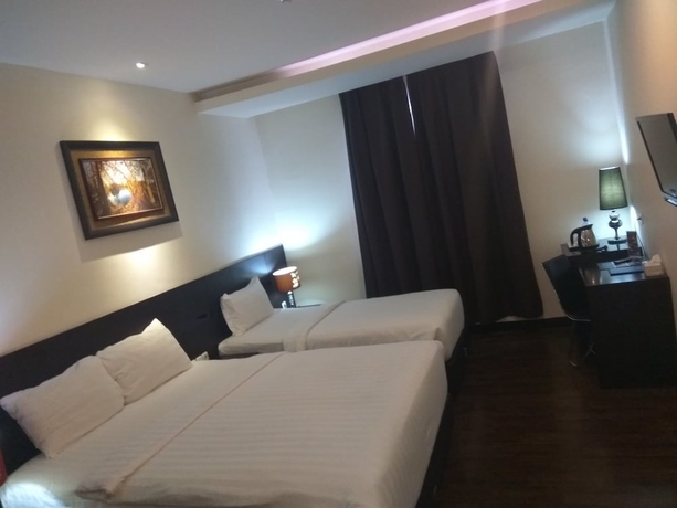 Imagen de la habitación del Hotel Continent Centrepoint Panakkukang. Foto 7