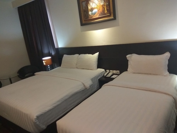 Imagen de la habitación del Hotel Continent Centrepoint Panakkukang. Foto 9