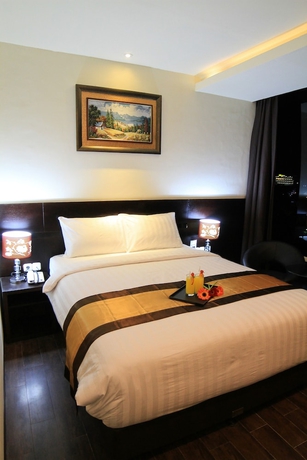 Imagen de la habitación del Hotel Continent Centrepoint Panakkukang. Foto 12