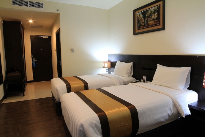 Imagen de la habitación del Hotel Continent Centrepoint Panakkukang. Foto 14