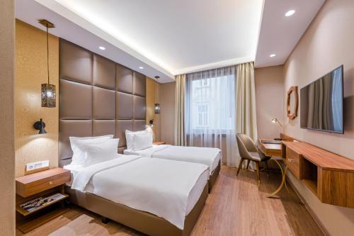 Imagen de la habitación del Hotel Continental Budapest. Foto 5