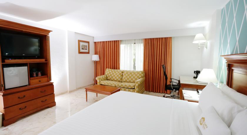 Imagen de la habitación del Hotel Continental Caribe Bay. Foto 5