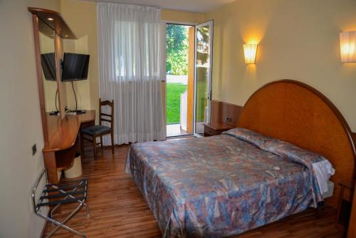 Imagen de la habitación del Hotel Continental, Garda. Foto 8